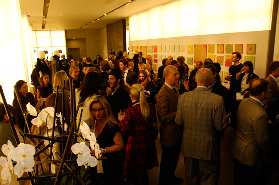 Evelyn Tompkins Projects Crowd at Reception