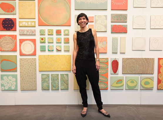 Marta Luz Gutiérrez in front of El Mercado installation Evelyn Tompkins Projects